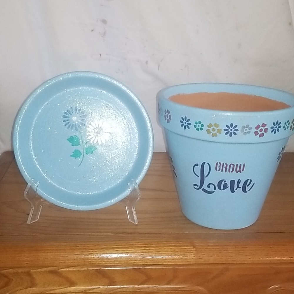 These are handpainted clay and terracotta pots
